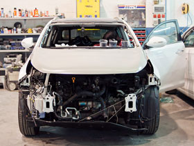 Reparación en la carrocería de Kia Sportage. Antes